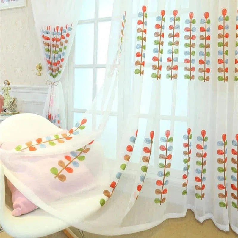 Rideau décoratif pour intérieur, motif floral coloré, idéal pour ajouter une touche de fraîcheur et de style à votre salon ou chambre. Design moderne et élégant pour un éclairage naturel optimal. Accessoire de maison parfait pour créer une ambiance lumineuse et accueillante.