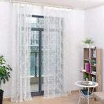 Voilage transparent blanc pour fenêtres, idéal pour un intérieur élégant et lumineux. S'accorde avec tous les styles de décoration, apportant une touche de fraîcheur à votre salon ou chambre. Parfait pour laisser entrer la lumière tout en préservant une certaine intimité.
