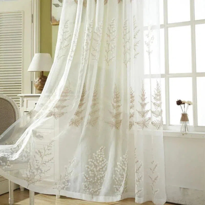 Rideau délicat avec motifs végétaux, idéal pour embellir un salon ou une chambre. Sa transparence laisse filtrer la lumière tout en préservant l'intimité de votre espace intérieur. Parfait pour une décoration moderne et élégante. Convient à toutes les tailles de fenêtres standard. Effet lumineux et apaisant garanti.