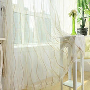 voilage fenêtre cuisine blanc lignes incurvées transparent moderne métalliques cordelette pompons fleurs pot osier