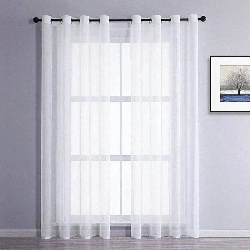 Voilage élégant pour fenêtre, idéal pour ajouter une touche moderne et lumineuse à votre intérieur. Ce rideau blanc tendance s’intègre parfaitement dans un salon ou une chambre, offrant une belle diffusion de la lumière tout en préservant l'intimité. Découvrez comment transformer votre espace avec cet accessoire de décoration incontournable.