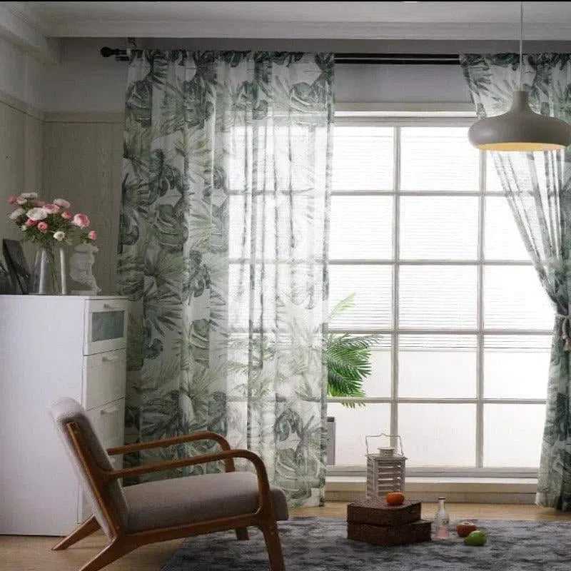 Rideaux à motifs de feuilles, idéaux pour ajouter une touche naturelle et élégante à votre salon. Ces rideaux apportent luminosité et verdure, complétant parfaitement un intérieur moderne ou scandinave. Un choix parfait pour ceux qui souhaitent intégrer des éléments de la nature dans leur décoration intérieure.