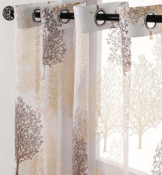 Rideaux transparents modernes avec motifs d'arbres, parfaits pour ajouter une touche élégante et naturelle à votre décoration intérieure. Ces rideaux offrent une filtration douce de la lumière, créant une ambiance chaleureuse et apaisante dans votre maison. Faciles à installer grâce à leurs œillets, ils conviennent idéalement aux salons, chambres ou bureaux. Transformez votre espace avec ce charmant design évoquant la nature.