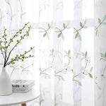 Rideaux translucides à motif floral vert pour décoration intérieure moderne. Apporte luminosité et élégance à votre salon ou chambre. Idéal pour créer une ambiance naturelle et apaisante. Accessoire déco parfait pour personnaliser votre espace de vie avec style et raffinement.